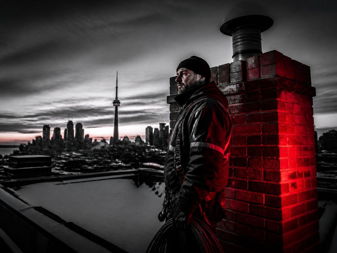 WETT-certified technician inspecting a Toronto rooftop chimney
